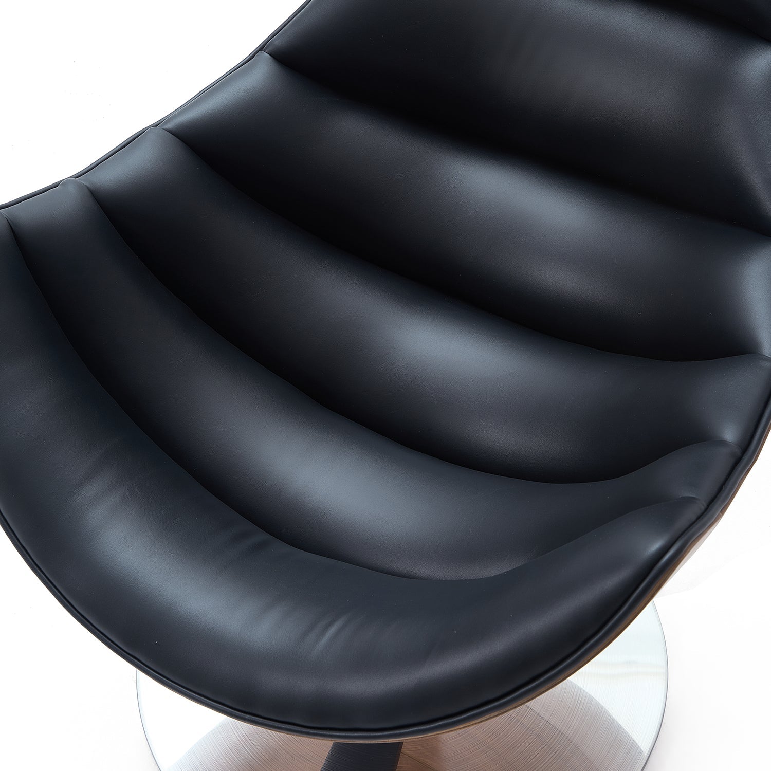 The Avant Glide Chair and Ottoman - Mario Capasa