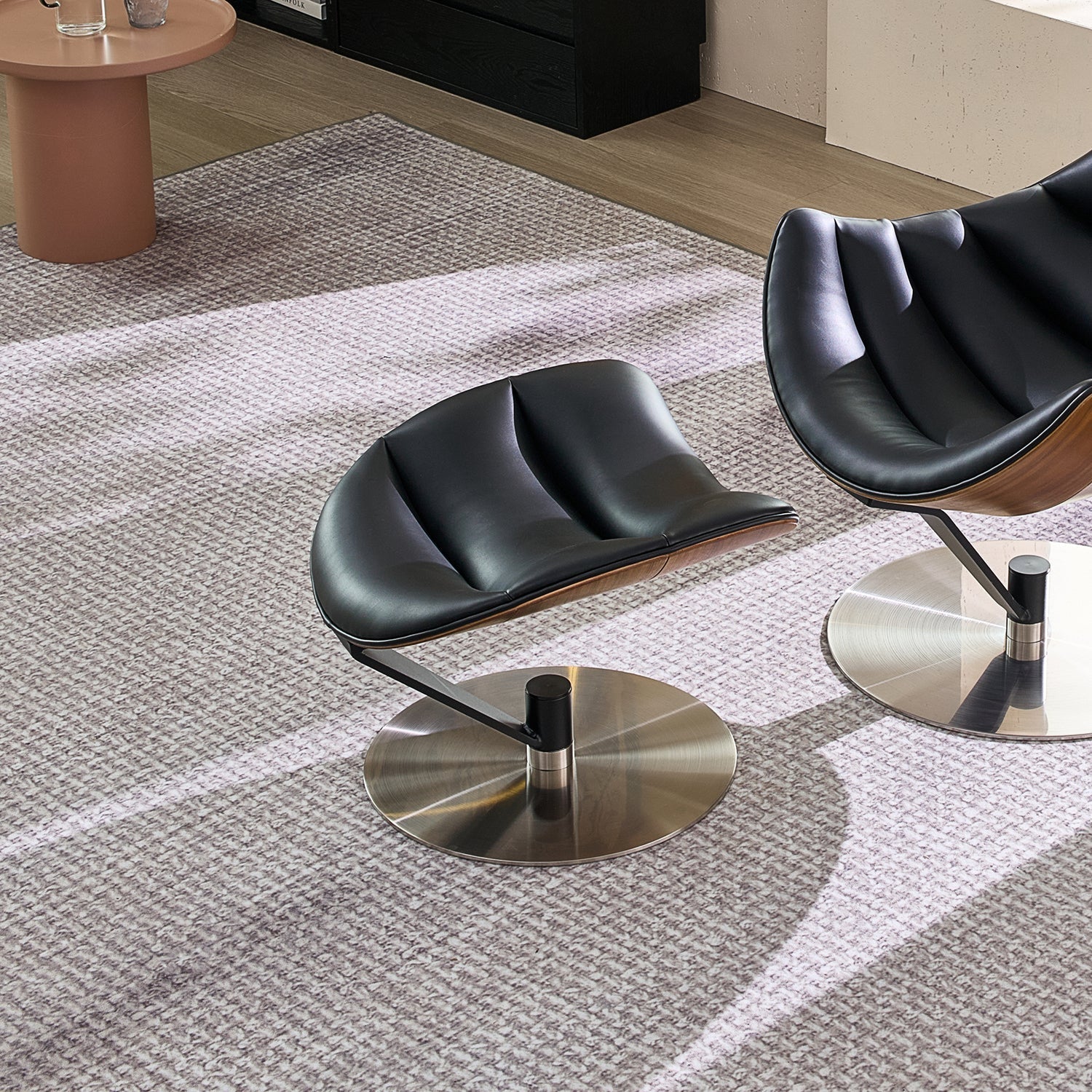 The Avant Glide Chair and Ottoman - Mario Capasa